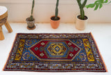 Vintage mini kilim rug in room decor setting, kilim, Turkish rug, vintage rug, portland, rug shop, bright colors, wild shaman, soft rug, bold color, Portland, Oregon, rug store, rug shop, local shop