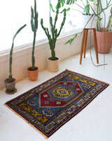 Vintage mini kilim rug in room decor setting, kilim, Turkish rug, vintage rug, portland, rug shop, bright colors, wild shaman, soft rug, bold color, Portland, Oregon, rug store, rug shop, local shop