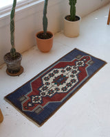 Vintage mini kilim rug in room decor setting, kilim, Turkish rug, vintage rug, portland, rug shop, bright colors, wild shaman, soft rug, bold color, Portland, Oregon, rug store, rug shop, local shop