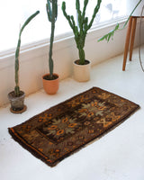 Vintage mini kilim rug in room decor setting, kilim, Turkish rug, vintage rug, portland, rug shop, bright colors, wild shaman, soft rug, bold color, Portland, Oregon, rug store, rug shop, local shop