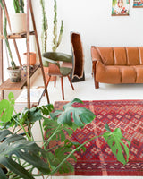 Vintage kilim rug in room decor setting, old rug, antique rug, pastel colors, faded colors, Turkish rug, vintage rug, soft rug, Portland, Oregon, rug store, rug shop, local shop, distressed rug, worn out rug