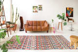 Vintage art deco rug in a living room setting, pile rug, Turkish rug, custom rug, modern rug, art deco rug,  portland, rug shop, bright colors, wild shaman, low pile rug, bold color, Portland, Oregon, rug store, rug shop, local shop, made in Turkey, vintage rug, retro rug