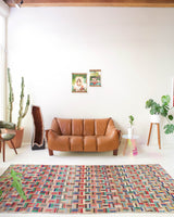 Vintage art deco rug in a living room setting, pile rug, Turkish rug, custom rug, modern rug, art deco rug,  portland, rug shop, bright colors, wild shaman, low pile rug, bold color, Portland, Oregon, rug store, rug shop, local shop, made in Turkey, vintage rug, retro rug