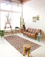 Vintage art deco rug in a living room setting, pile rug, Turkish rug, custom rug, modern rug, art deco rug,  portland, rug shop, bright colors, wild shaman, low pile rug, bold color, Portland, Oregon, rug store, rug shop, local shop, made in Turkey, vintage rug, retro rug