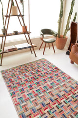 Vintage art deco rug in a living room setting, pile rug, Turkish rug, custom rug, modern rug, art deco rug,  portland, rug shop, bright colors, wild shaman, low pile rug, bold color, Portland, Oregon, rug store, rug shop, local shop, made in Turkey, vintage rug, retro rug
