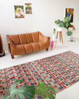 Vintage art deco rug in a living room setting, pile rug, Turkish rug, custom rug, modern rug, art deco rug,  portland, rug shop, bright colors, wild shaman, low pile rug, bold color, Portland, Oregon, rug store, rug shop, local shop, made in Turkey, vintage rug, retro rug