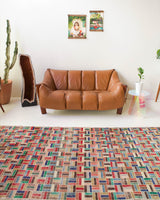 Vintage art deco rug in a living room setting, pile rug, Turkish rug, custom rug, modern rug, art deco rug,  portland, rug shop, bright colors, wild shaman, low pile rug, bold color, Portland, Oregon, rug store, rug shop, local shop, made in Turkey, vintage rug, retro rug