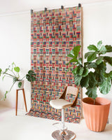 Vintage art deco rug in a living room setting, pile rug, Turkish rug, custom rug, modern rug, art deco rug,  portland, rug shop, bright colors, wild shaman, low pile rug, bold color, Portland, Oregon, rug store, rug shop, local shop, made in Turkey, vintage rug, retro rug