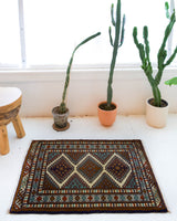 Vintage mini kilim rug in room decor setting, kilim, Turkish rug, vintage rug, portland, rug shop, bright colors, wild shaman, soft rug, bold color, Portland, Oregon, rug store, rug shop, local shop