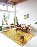 Vintage art deco rug in a living room setting, pile rug, Turkish rug, custom rug, modern rug, art deco rug,  portland, rug shop, bright colors, wild shaman, low pile rug, bold color, Portland, Oregon, rug store, rug shop, local shop, made in Turkey, vintage rug, retro rug