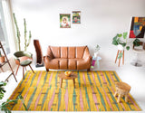 Vintage art deco rug in a living room setting, pile rug, Turkish rug, custom rug, modern rug, art deco rug,  portland, rug shop, bright colors, wild shaman, low pile rug, bold color, Portland, Oregon, rug store, rug shop, local shop, made in Turkey, vintage rug, retro rug