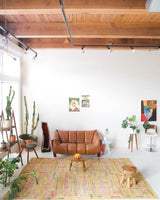 Vintage art deco rug in a living room setting, pile rug, Turkish rug, custom rug, modern rug, art deco rug,  portland, rug shop, bright colors, wild shaman, low pile rug, bold color, Portland, Oregon, rug store, rug shop, local shop, made in Turkey, vintage rug, retro rug