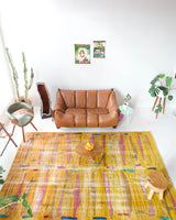 Vintage art deco rug in a living room setting, pile rug, Turkish rug, custom rug, modern rug, art deco rug,  portland, rug shop, bright colors, wild shaman, low pile rug, bold color, Portland, Oregon, rug store, rug shop, local shop, made in Turkey, vintage rug, retro rug