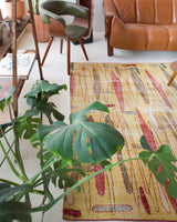 Vintage art deco rug in a living room setting, pile rug, Turkish rug, custom rug, modern rug, art deco rug,  portland, rug shop, bright colors, wild shaman, low pile rug, bold color, Portland, Oregon, rug store, rug shop, local shop, made in Turkey, vintage rug, retro rug