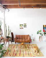 Vintage art deco rug in a living room setting, pile rug, Turkish rug, custom rug, modern rug, art deco rug,  portland, rug shop, bright colors, wild shaman, low pile rug, bold color, Portland, Oregon, rug store, rug shop, local shop, made in Turkey, vintage rug, retro rug
