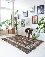 Vintage kilim rug in room decor setting, old rug, antique rug, pastel colors, faded colors, Turkish rug, vintage rug, soft rug, Portland, Oregon, rug store, rug shop, local shop, bold colors, bright colors, faded colors