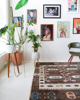 Vintage kilim rug in room decor setting, old rug, antique rug, pastel colors, faded colors, Turkish rug, vintage rug, soft rug, Portland, Oregon, rug store, rug shop, local shop, bold colors, bright colors, faded colors