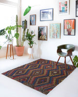 Vintage kilim rug in living room setting, bright colors, wild shaman, soft rug, bold color, Portland, Oregon, rug store, rug shop, local shop, vintage rug, modern kilim, warm colors