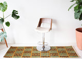 Vintage art deco rug in a living room setting, pile rug, Turkish rug, custom rug, modern rug, art deco rug,  portland, rug shop, bright colors, wild shaman, low pile rug, bold color, Portland, Oregon, rug store, rug shop, local shop, made in Turkey, vintage rug, retro rug