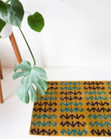 Vintage art deco rug in a living room setting, pile rug, Turkish rug, custom rug, modern rug, art deco rug,  portland, rug shop, bright colors, wild shaman, low pile rug, bold color, Portland, Oregon, rug store, rug shop, local shop, made in Turkey, vintage rug, retro rug