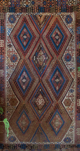 Vintage kilim rug in living room setting, old rug, antique rug, pastel colors, faded colors, Turkish rug, vintage rug, soft rug, Portland, Oregon, rug store, rug shop, local shop, earthy tones, earthy colors, warm colors