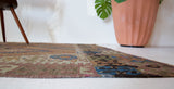 Vintage kilim rug in living room setting, old rug, antique rug, pastel colors, faded colors, Turkish rug, vintage rug, soft rug, Portland, Oregon, rug store, rug shop, local shop, earthy tones, earthy colors, warm colors