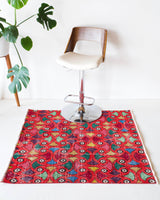 Vintage art deco rug in a living room setting, pile rug, Turkish rug, custom rug, modern rug, art deco rug,  portland, rug shop, bright colors, wild shaman, low pile rug, bold color, Portland, Oregon, rug store, rug shop, local shop, made in Turkey, vintage rug, retro rug
