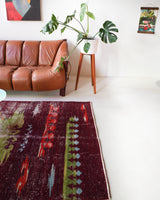 Vintage art deco rug in a living room setting, pile rug, Turkish rug, custom rug, modern rug, art deco rug,  portland, rug shop, bright colors, wild shaman, low pile rug, bold color, Portland, Oregon, rug store, rug shop, local shop, made in Turkey, vintage rug, retro rug