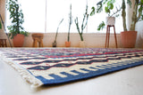 Vintage kilim rug in living room setting, bright colors, wild shaman, soft rug, bold color, Portland, Oregon, rug store, rug shop, local shop, vintage rug, modern kilim, warm colors