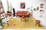 Vintage art deco rug in a living room setting, pile rug, Turkish rug, custom rug, modern rug, art deco rug,  portland, rug shop, bright colors, wild shaman, low pile rug, bold color, Portland, Oregon, rug store, rug shop, local shop, made in Turkey, vintage rug, retro rug
