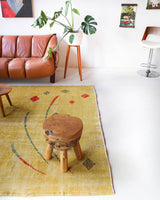Vintage art deco rug in a living room setting, pile rug, Turkish rug, custom rug, modern rug, art deco rug,  portland, rug shop, bright colors, wild shaman, low pile rug, bold color, Portland, Oregon, rug store, rug shop, local shop, made in Turkey, vintage rug, retro rug