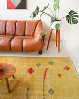 Vintage art deco rug in a living room setting, pile rug, Turkish rug, custom rug, modern rug, art deco rug,  portland, rug shop, bright colors, wild shaman, low pile rug, bold color, Portland, Oregon, rug store, rug shop, local shop, made in Turkey, vintage rug, retro rug
