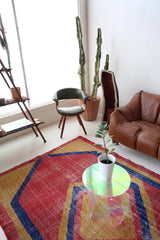 Vintage art deco rug in a living room setting, pile rug, Turkish rug, custom rug, modern rug, art deco rug,  portland, rug shop, bright colors, wild shaman, low pile rug, bold color, Portland, Oregon, rug store, rug shop, local shop, made in Turkey, vintage rug, retro rug
