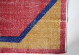 Vintage art deco rug in a living room setting, pile rug, Turkish rug, custom rug, modern rug, art deco rug,  portland, rug shop, bright colors, wild shaman, low pile rug, bold color, Portland, Oregon, rug store, rug shop, local shop, made in Turkey, vintage rug, retro rug
