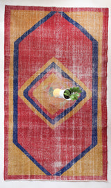 Vintage art deco rug in a living room setting, pile rug, Turkish rug, custom rug, modern rug, art deco rug,  portland, rug shop, bright colors, wild shaman, low pile rug, bold color, Portland, Oregon, rug store, rug shop, local shop, made in Turkey, vintage rug, retro rug