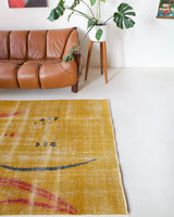Vintage art deco rug in a living room setting, pile rug, Turkish rug, custom rug, modern rug, art deco rug,  portland, rug shop, bright colors, wild shaman, low pile rug, bold color, Portland, Oregon, rug store, rug shop, local shop, made in Turkey, vintage rug, retro rug