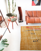 Vintage art deco rug in a living room setting, pile rug, Turkish rug, custom rug, modern rug, art deco rug,  portland, rug shop, bright colors, wild shaman, low pile rug, bold color, Portland, Oregon, rug store, rug shop, local shop, made in Turkey, vintage rug, retro rug