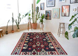 Vintage kilim rug in living room setting, bright colors, wild shaman, soft rug, bold color, Portland, Oregon, rug store, rug shop, local shop, vintage rug, modern kilim, warm colors