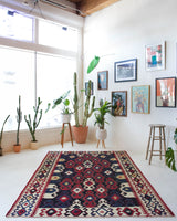 Vintage kilim rug in living room setting, bright colors, wild shaman, soft rug, bold color, Portland, Oregon, rug store, rug shop, local shop, vintage rug, modern kilim, warm colors