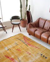 Vintage art deco rug in a living room setting, pile rug, Turkish rug, custom rug, modern rug, art deco rug,  portland, rug shop, bright colors, wild shaman, low pile rug, bold color, Portland, Oregon, rug store, rug shop, local shop, made in Turkey, vintage rug, retro rug