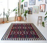Vintage kilim rug in living room setting, bright colors, wild shaman, soft rug, bold color, Portland, Oregon, rug store, rug shop, local shop, vintage rug, modern kilim, warm colors