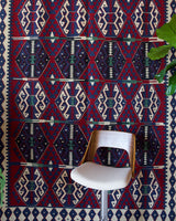 Vintage kilim rug in living room setting, bright colors, wild shaman, soft rug, bold color, Portland, Oregon, rug store, rug shop, local shop, vintage rug, modern kilim, warm colors