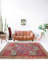 Vintage Turkish rug in living room setting, old rug, antique rug, pastel colors, faded colors, Turkish rug, vintage rug, soft rug, Portland, Oregon, rug store, rug shop, local shop