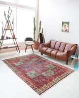 Vintage Turkish rug in living room setting, old rug, antique rug, pastel colors, faded colors, Turkish rug, vintage rug, soft rug, Portland, Oregon, rug store, rug shop, local shop
