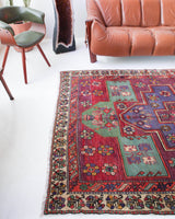 Vintage Turkish rug in living room setting, old rug, antique rug, pastel colors, faded colors, Turkish rug, vintage rug, soft rug, Portland, Oregon, rug store, rug shop, local shop