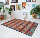 Vintage kilim rug in living room setting, bright colors, wild shaman, soft rug, bold color, Portland, Oregon, rug store, rug shop, local shop, vintage rug, modern kilim, warm colors