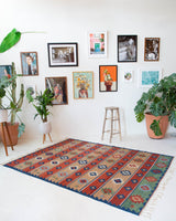 Vintage kilim rug in living room setting, bright colors, wild shaman, soft rug, bold color, Portland, Oregon, rug store, rug shop, local shop, vintage rug, modern kilim, warm colors