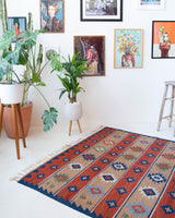 Vintage kilim rug in living room setting, bright colors, wild shaman, soft rug, bold color, Portland, Oregon, rug store, rug shop, local shop, vintage rug, modern kilim, warm colors