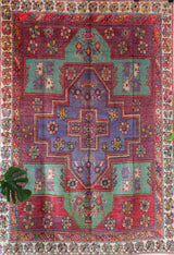 Vintage Turkish rug in living room setting, old rug, antique rug, pastel colors, faded colors, Turkish rug, vintage rug, soft rug, Portland, Oregon, rug store, rug shop, local shop
