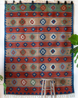 Vintage kilim rug in living room setting, bright colors, wild shaman, soft rug, bold color, Portland, Oregon, rug store, rug shop, local shop, vintage rug, modern kilim, warm colors